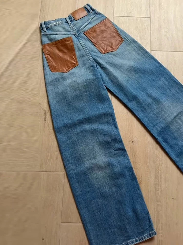 JEAN BLEU DÉTAILS CUIR
