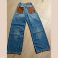JEAN BLEU DÉTAILS CUIR