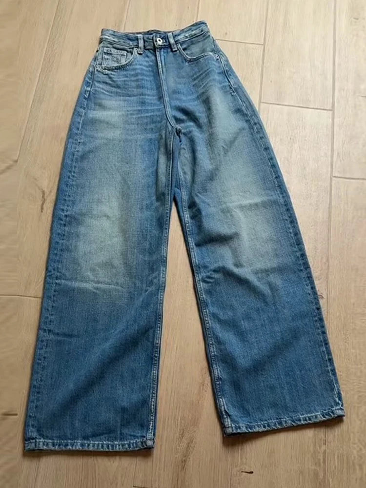 JEAN BLEU DÉTAILS CUIR